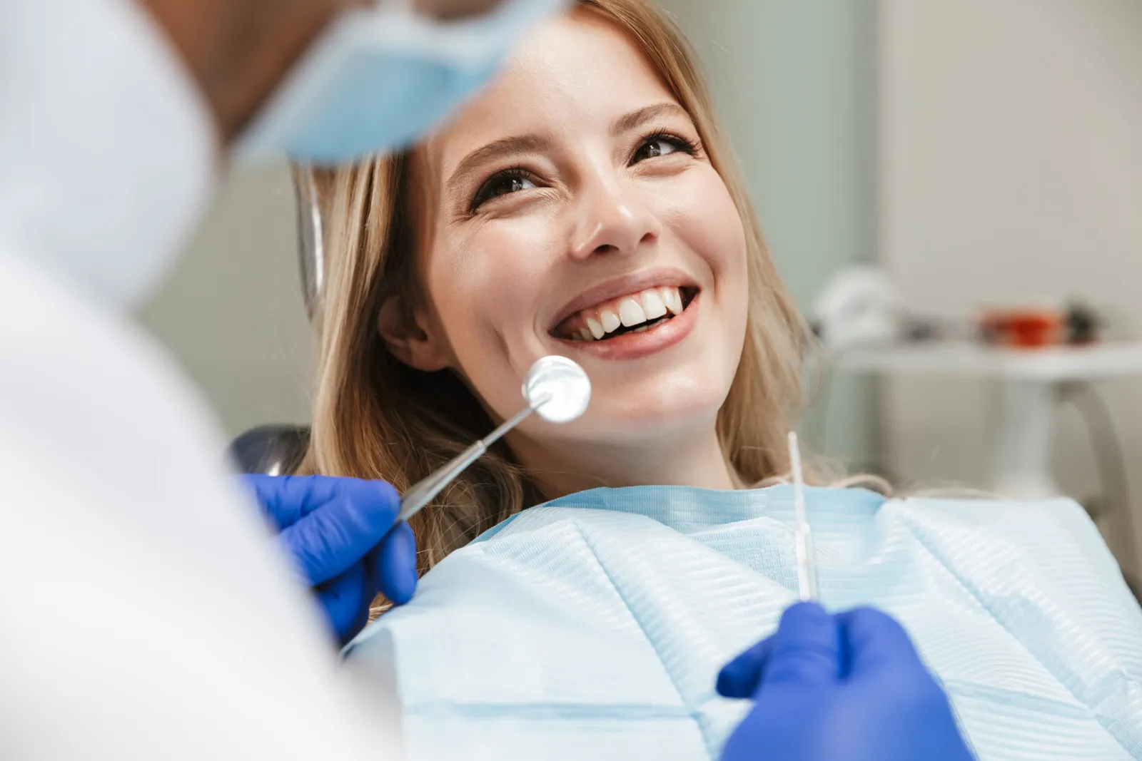 Dental Implant Costs in Downey: 2025 Pricing, Insurance, PPO/HMO Differences &amp; Payment Plans