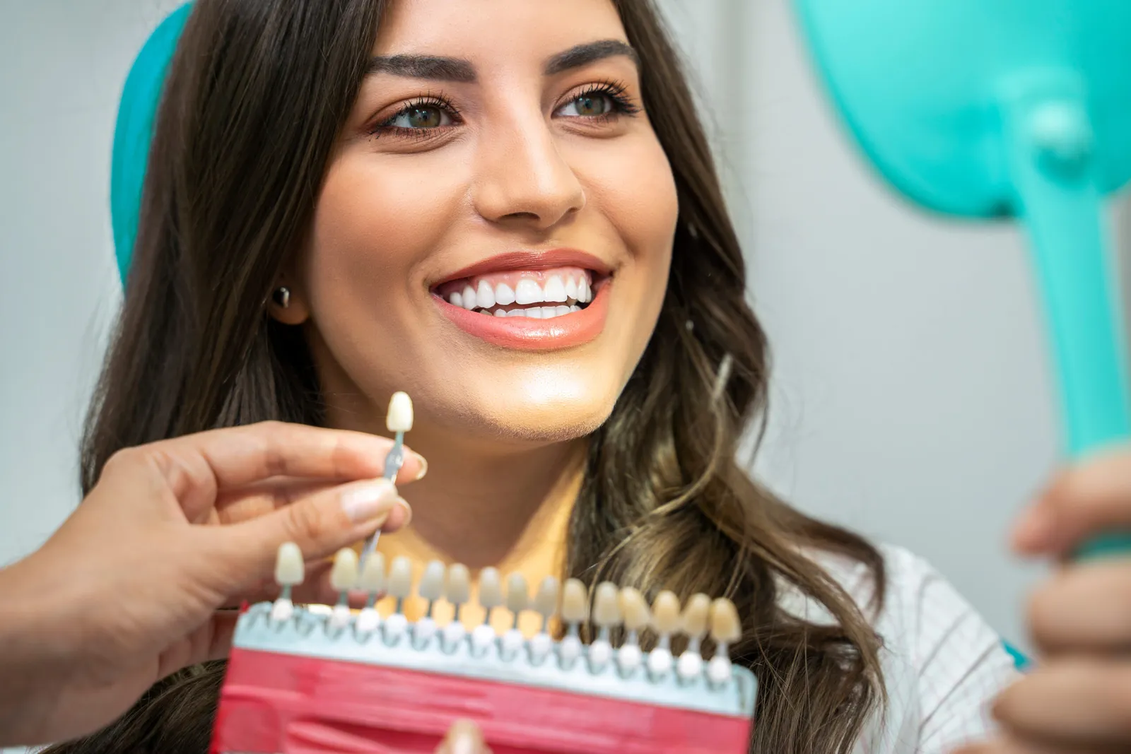 Smile Makeovers in Downey: Combining Veneers, Whitening, and Invisalign for Stunning Results